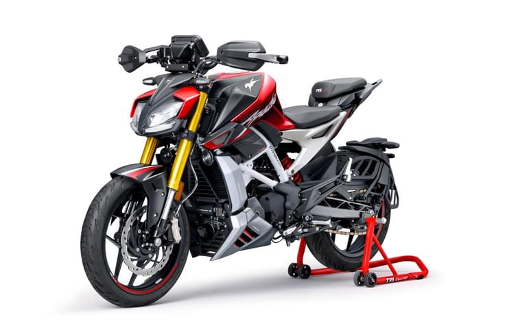 It has gained a new red colour, knuckle guards and sequential indicators with this update. TVS Apache RTR 310 front left static in studio